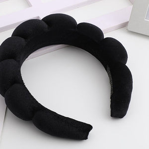 Cerchietto per capelli imbottito nero con una fila di bolle tonde