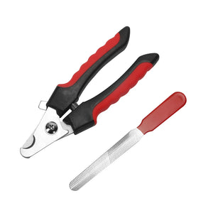 Tagliaunghie per cani con impugnature nere e rosse e lima per unghie su sfondo bianco