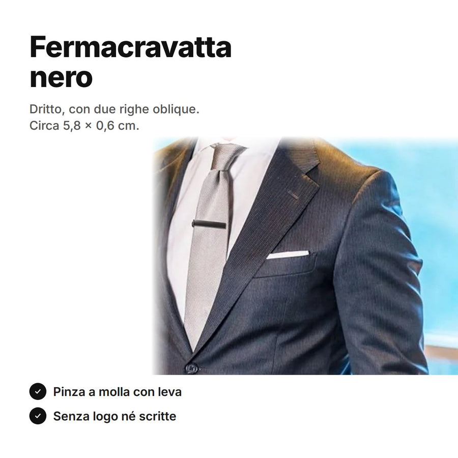 Fermacravatta nero su una cravatta grigia, con abito scuro e camicia bianca