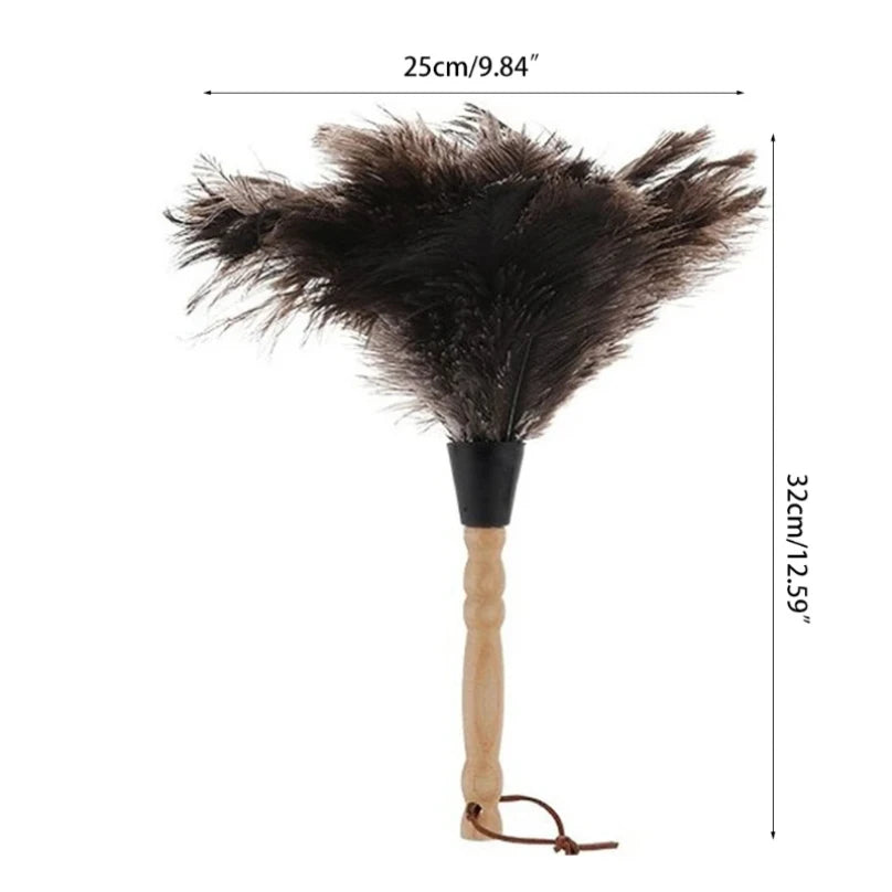 Misure del piumino: lungo circa 32 cm, parte in piume larga circa 25 cm