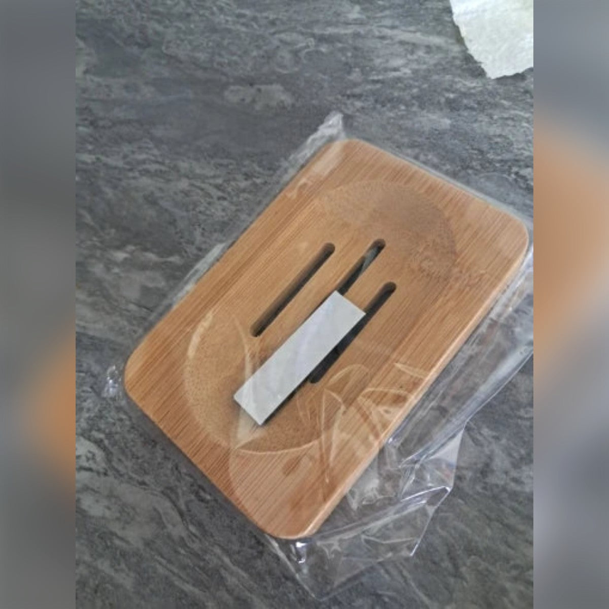 Foto di un acquirente: portasapone in bambù ancora nella sua busta di plastica