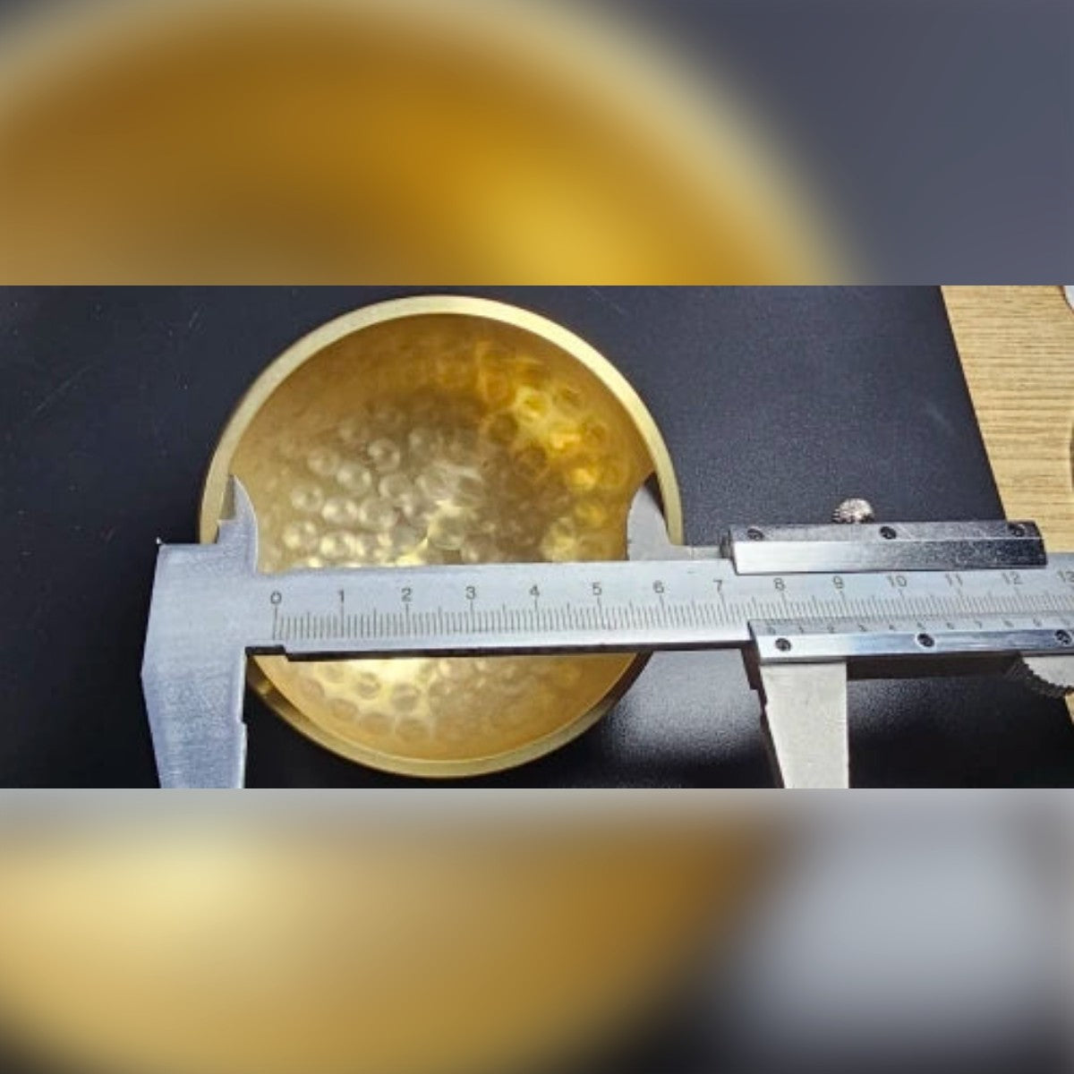 Foto di un cliente: la campana misurata con il calibro, circa 8 cm di diametro