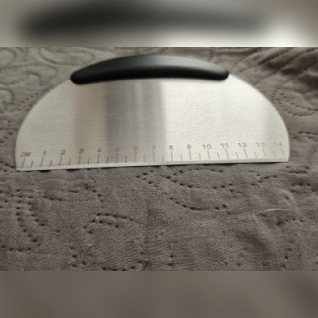 Foto di un cliente: il tarocco visto di fronte, con la scala in cm da 0 a 14