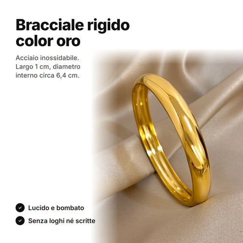 Bracciale rigido color oro, largo 1 cm, diametro interno circa 6,4 cm