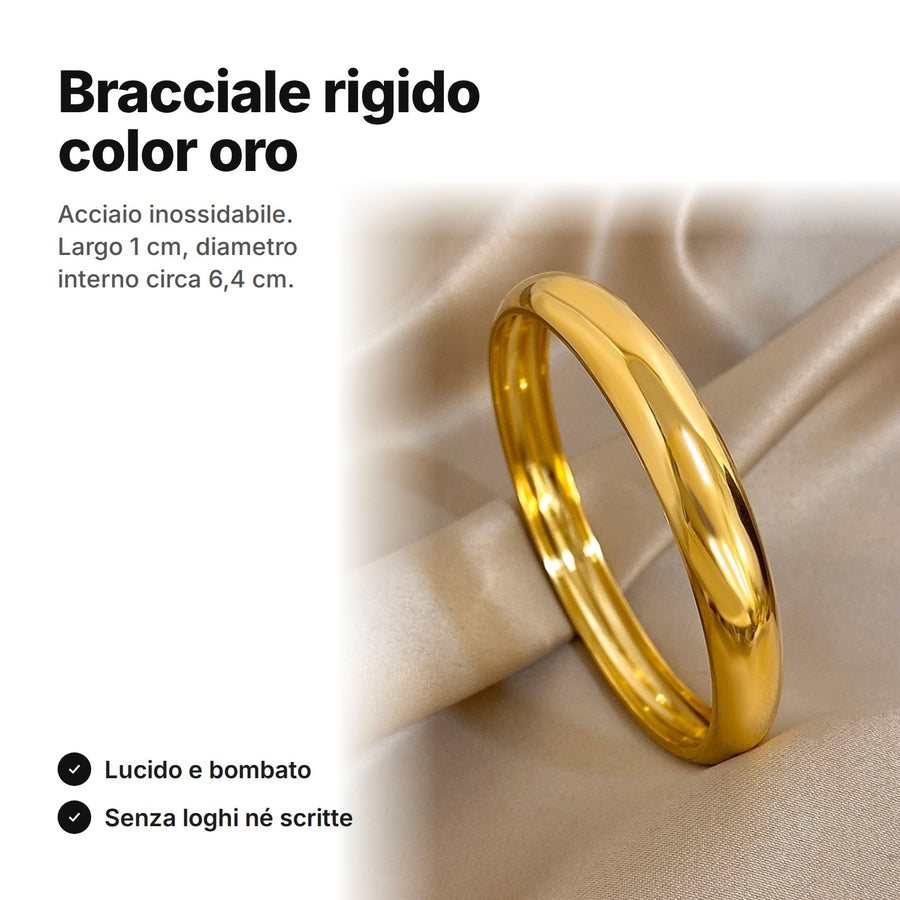 Bracciale rigido color oro, largo 1 cm, diametro interno circa 6,4 cm