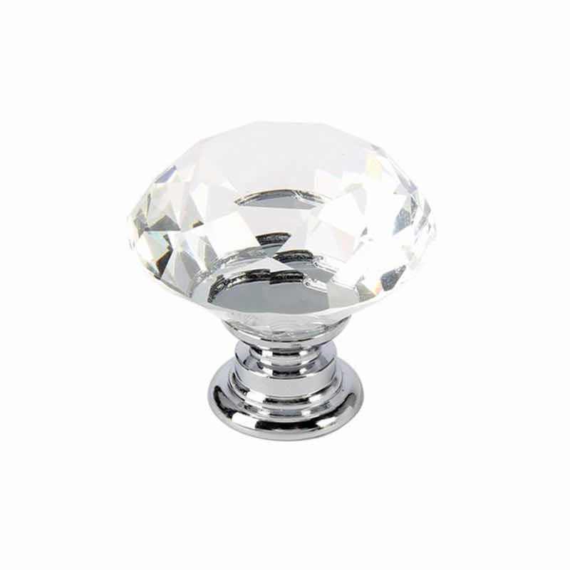 Pomello in vetro visto di lato: vetro tagliato a diamante e base a gradini color argento
